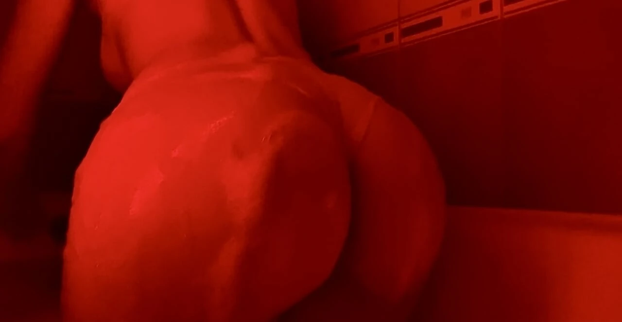 A naughty girl with juicy ass in lace gets wet from hot bubble bath while listening to emo tracks