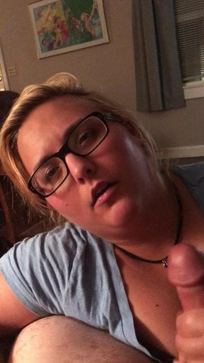 Young BBW in glasses handjob