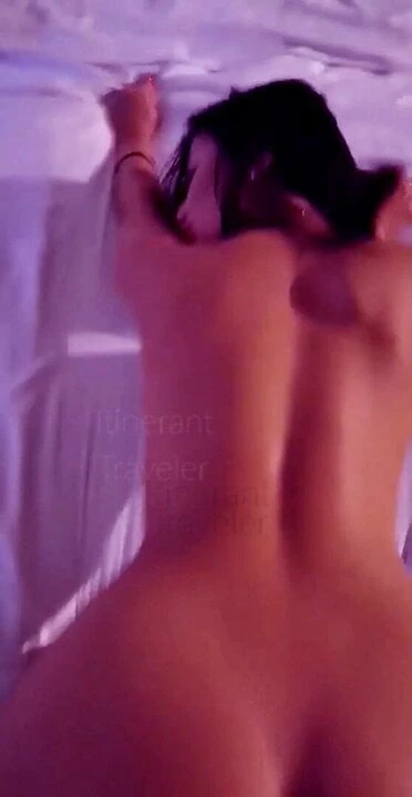 French Algerian grasping the bed sheet while taking a black cock