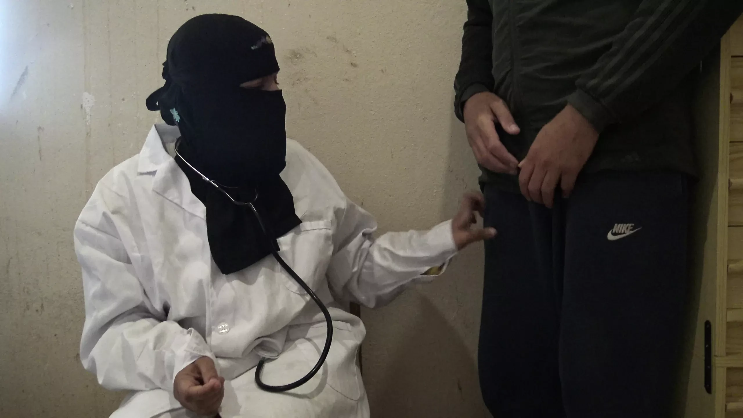 Naughty female muslim doctor gives a handjob to one of her patients