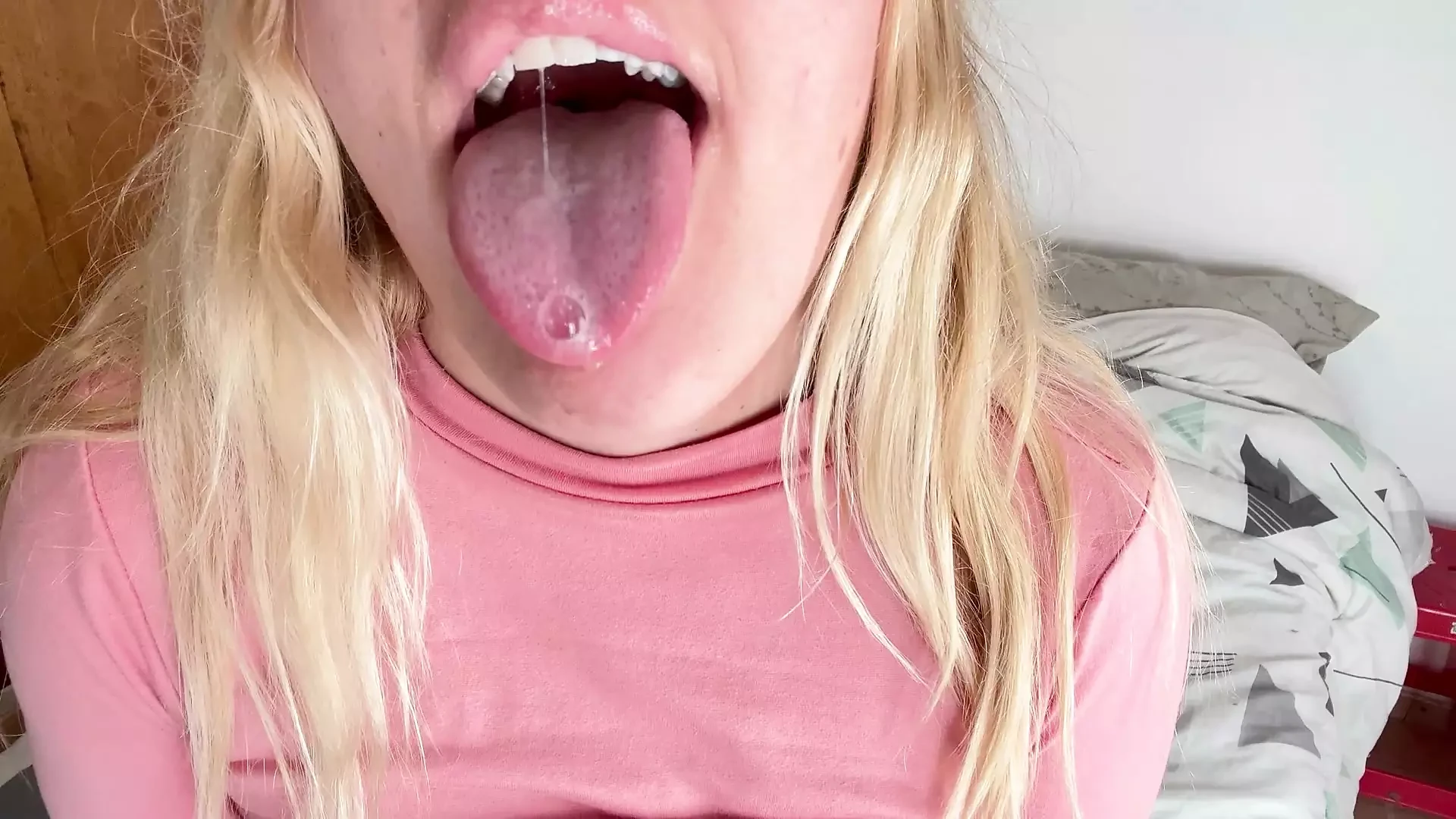 Does a slimy tongue turn you on while I spit on my tits?