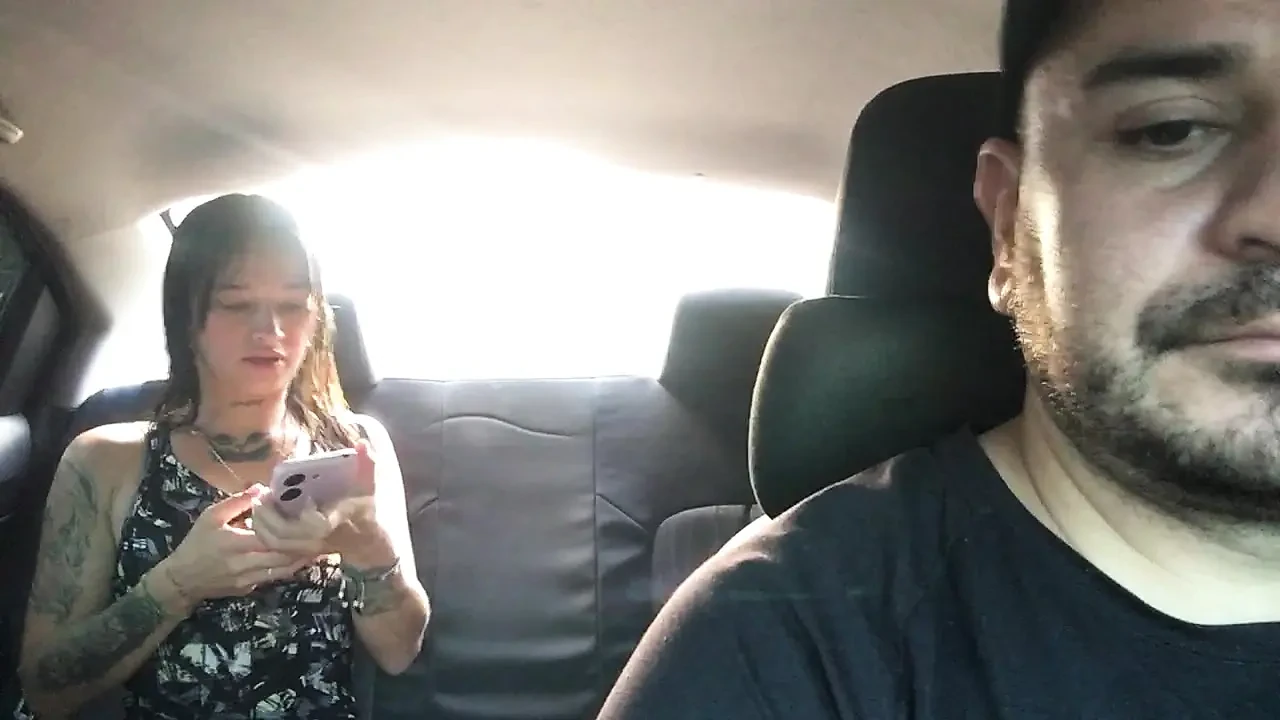 Latina girl encourages Uber driver to have sex on her way to work.