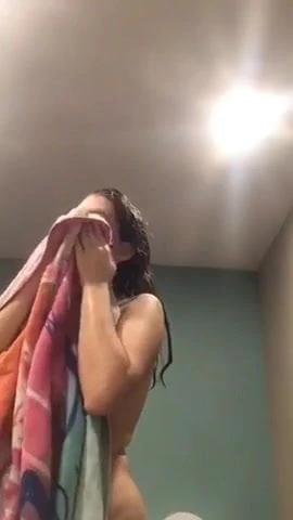 skinny girl with big and puffy nipples after shower