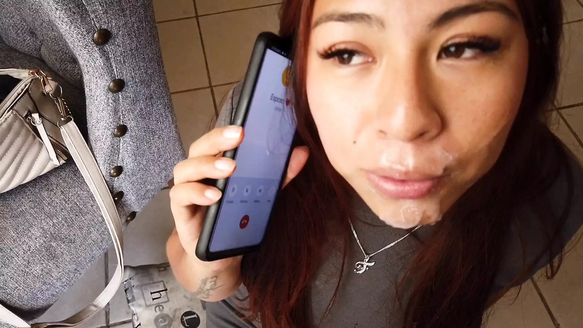 She sucks me off while talking to her husband on the phone