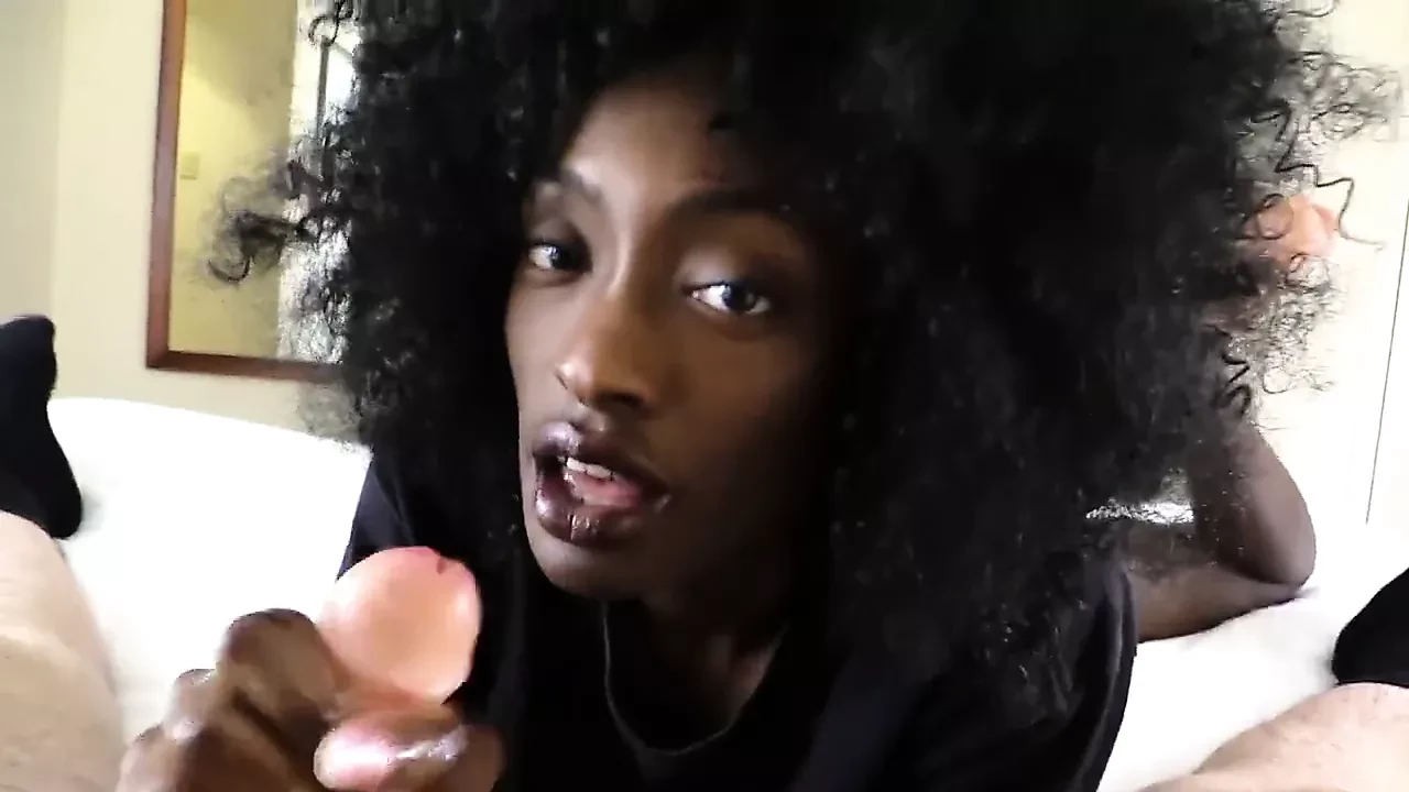 Ebony stroking cock