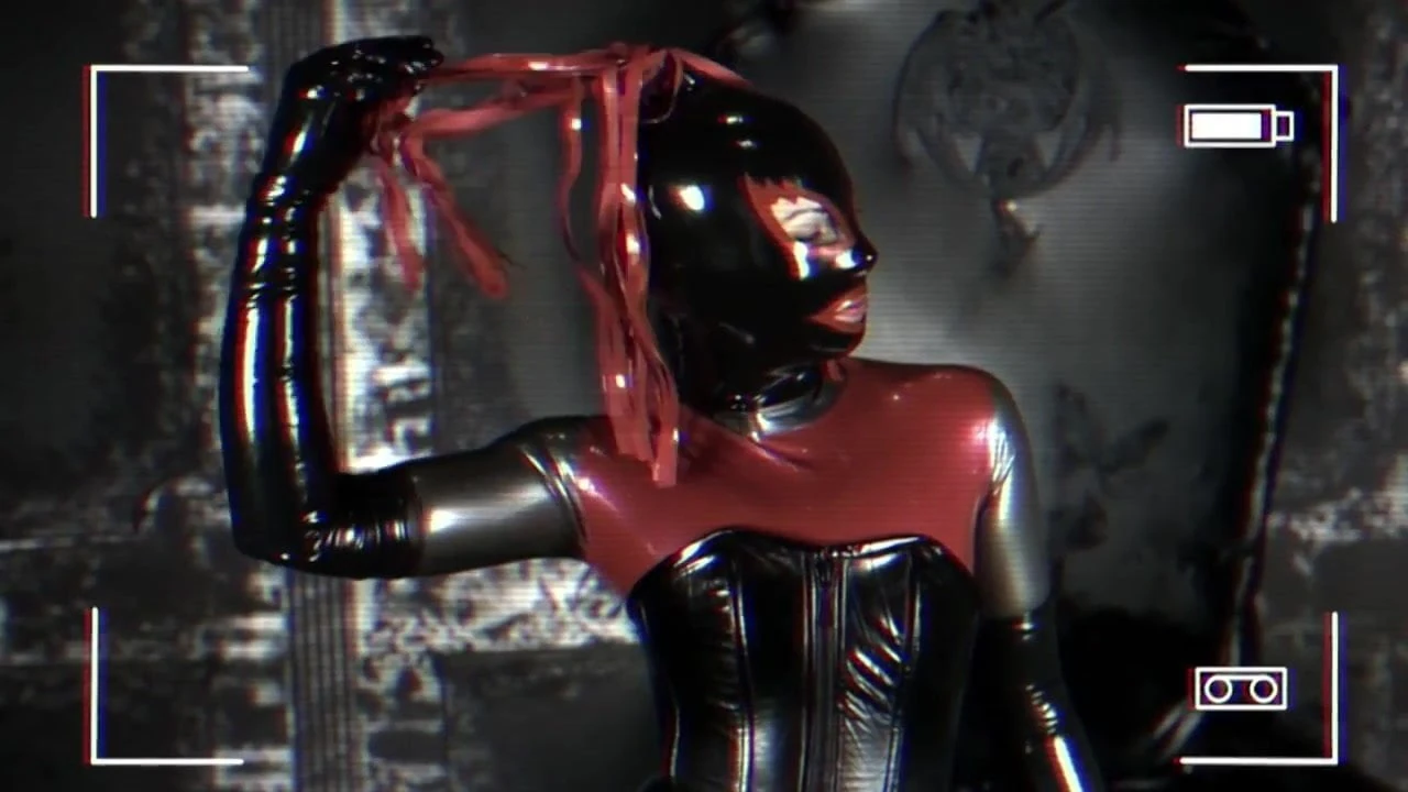 girl tries total enclosure in latex