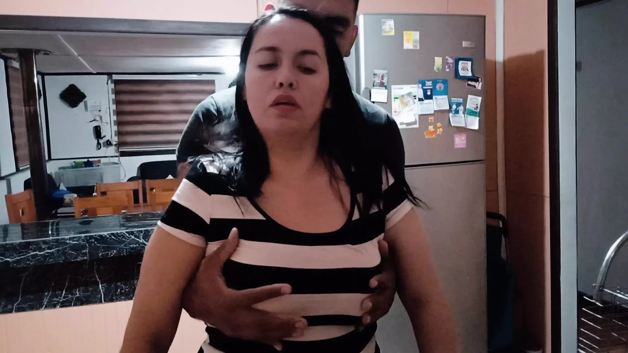 stepmother has sex with her stepson in the kitchen of the house