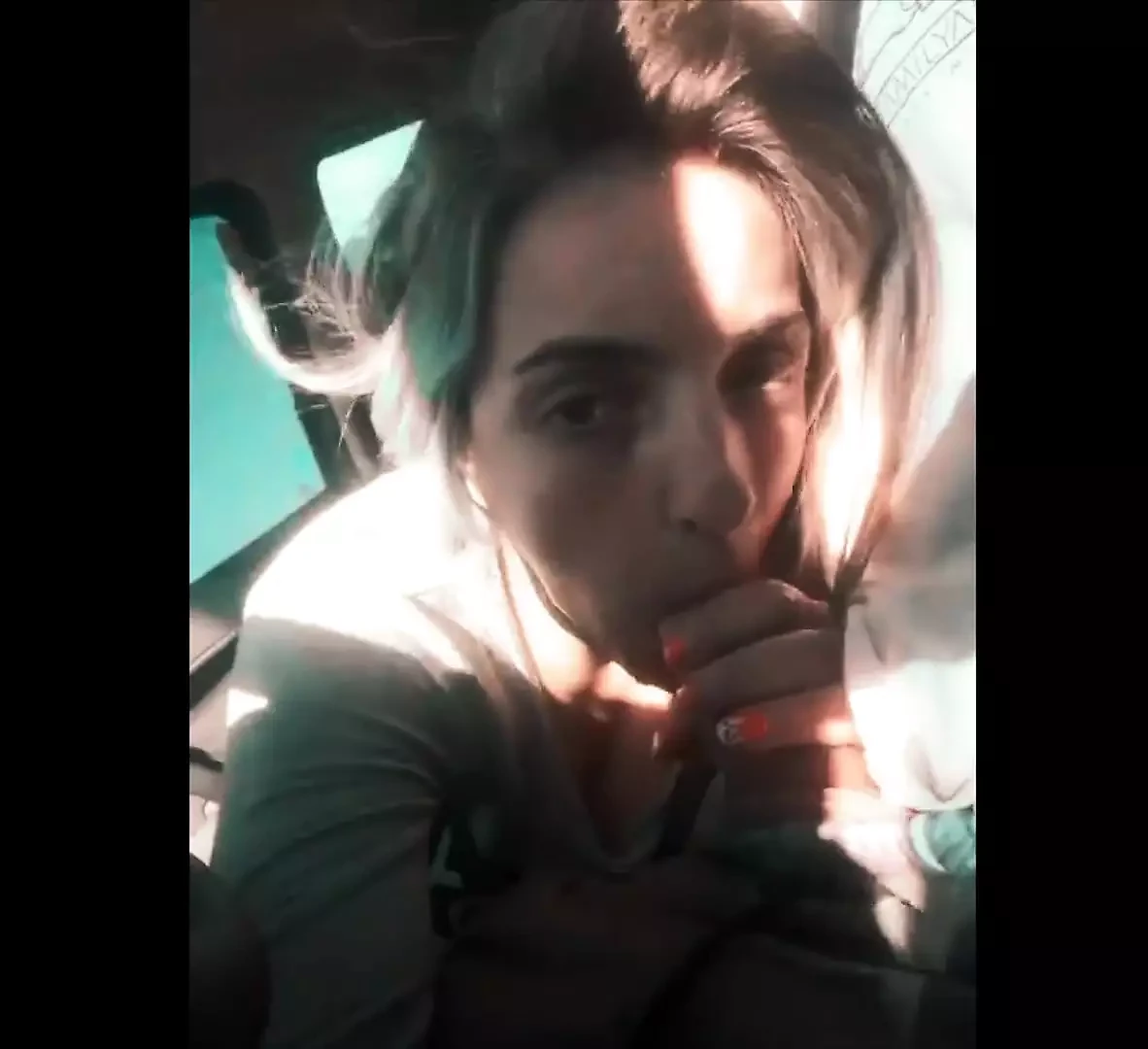 Professional cock sucker. She blows the cab driver to pay the fare.