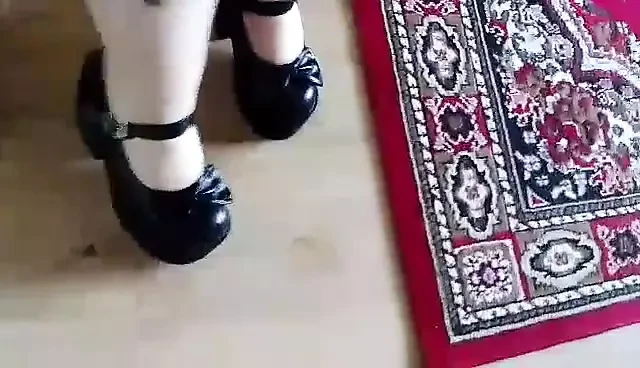 Black gothic heels at home