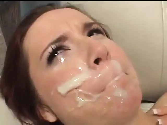 Lusty whore has warm cum running down her face after gang bang
