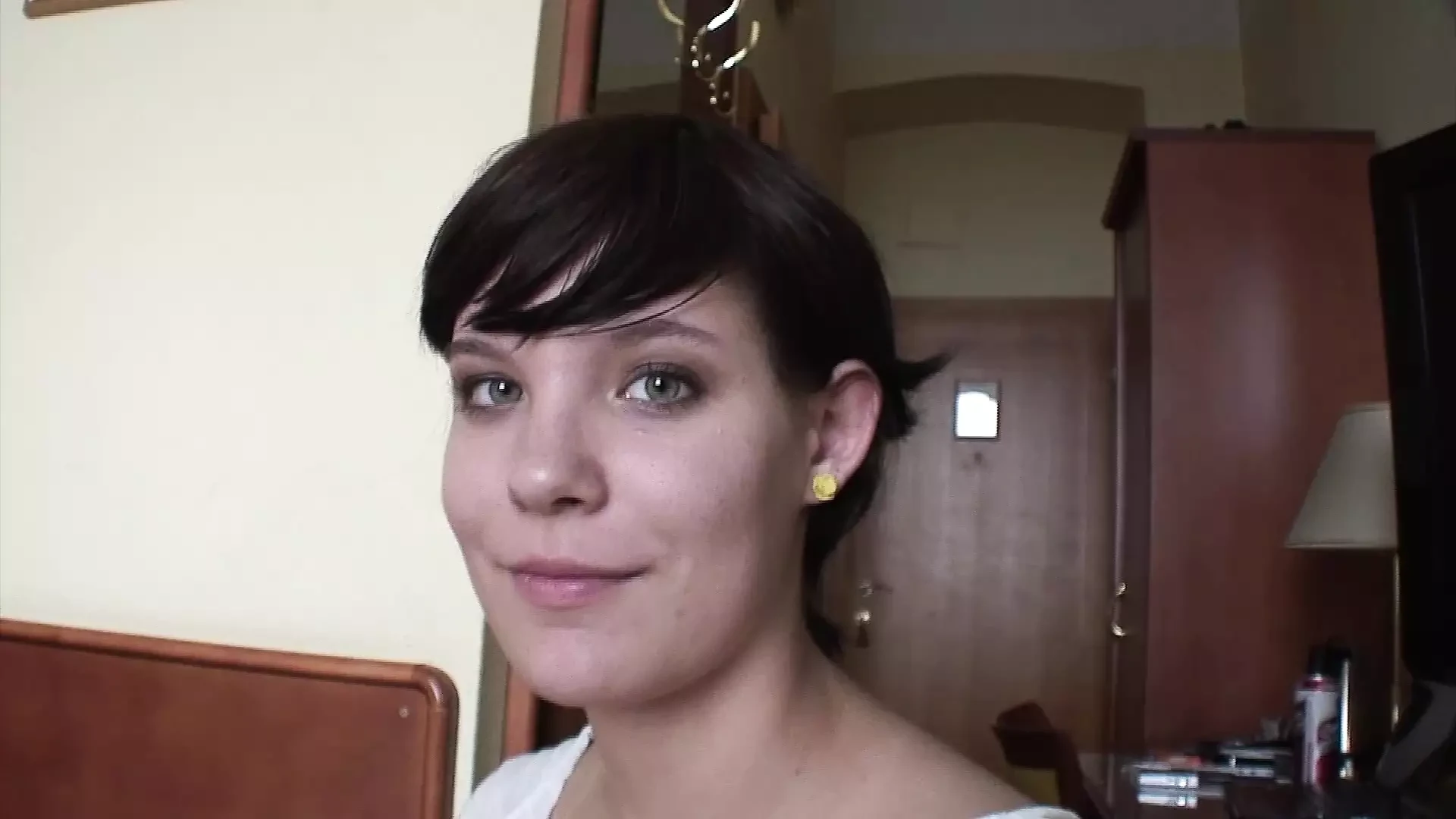 Short haired German girl pleasing her shaved twat with her glass toy